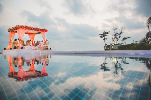 Mandap next to a swimming pool. Creative Indian wedding set up for an Indian Wedding in Italy.