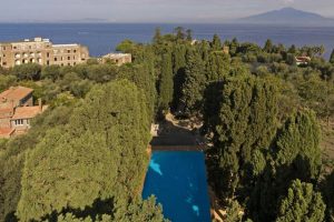 Aerial photo of the pool at Villa Zagara with Vesuvius in the background