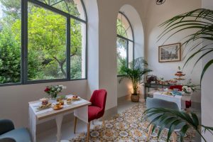 tropical breakfast room at wedding villa in Italy