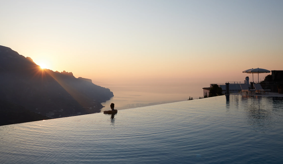 view of sunset from the infinity pool at Amalfi coast wedding venue