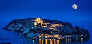 Mediterranean island wedding venue at night