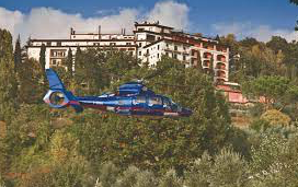 Private helicopter flying guests from Florence airport to Il Ciocco resort for a wedding.