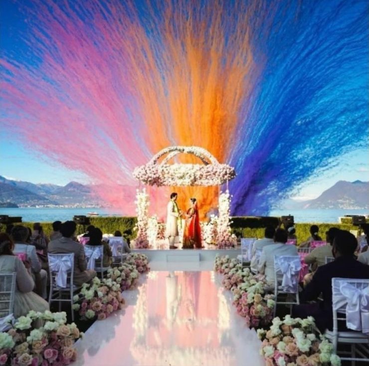 Beautiful coloured smoke bomb creates an amazing display at a Hindu wedding in Italy. Arranged by English wedding planner.